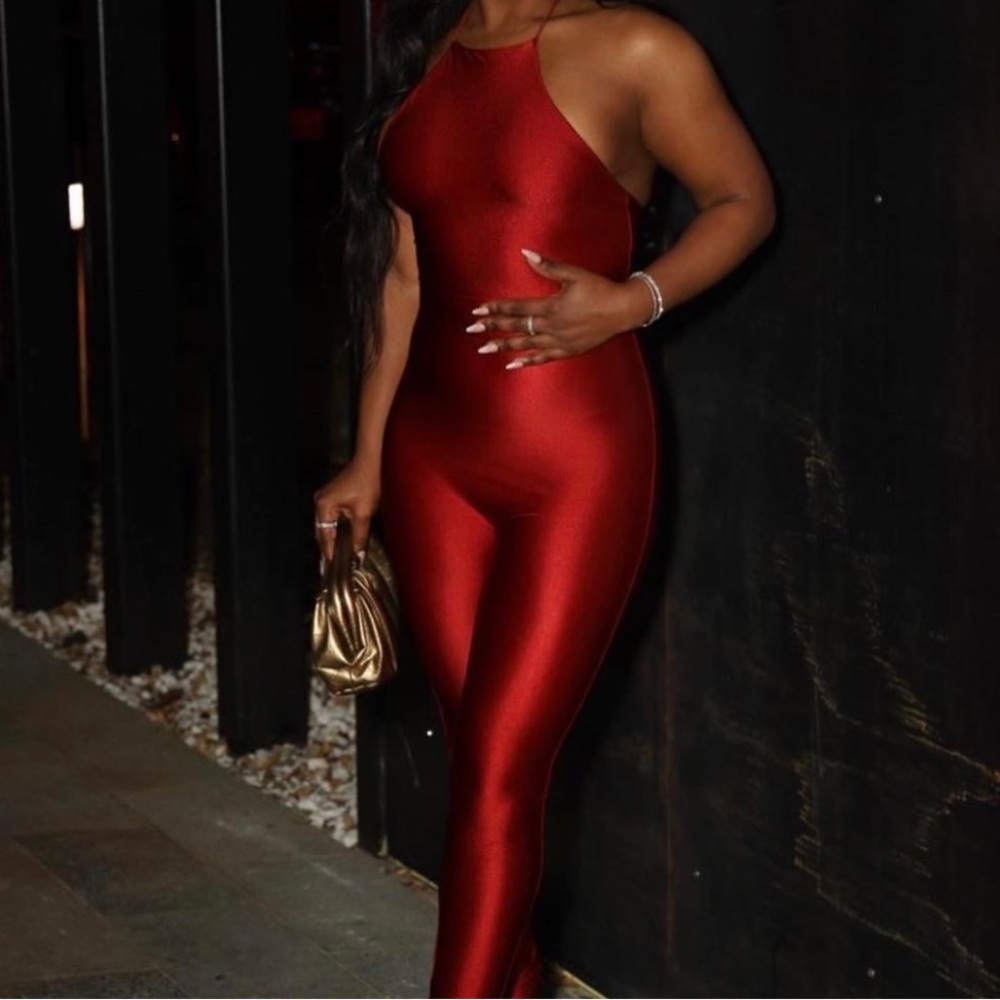 Brand New Red Jumpsuit size medium Naked Wardrobe